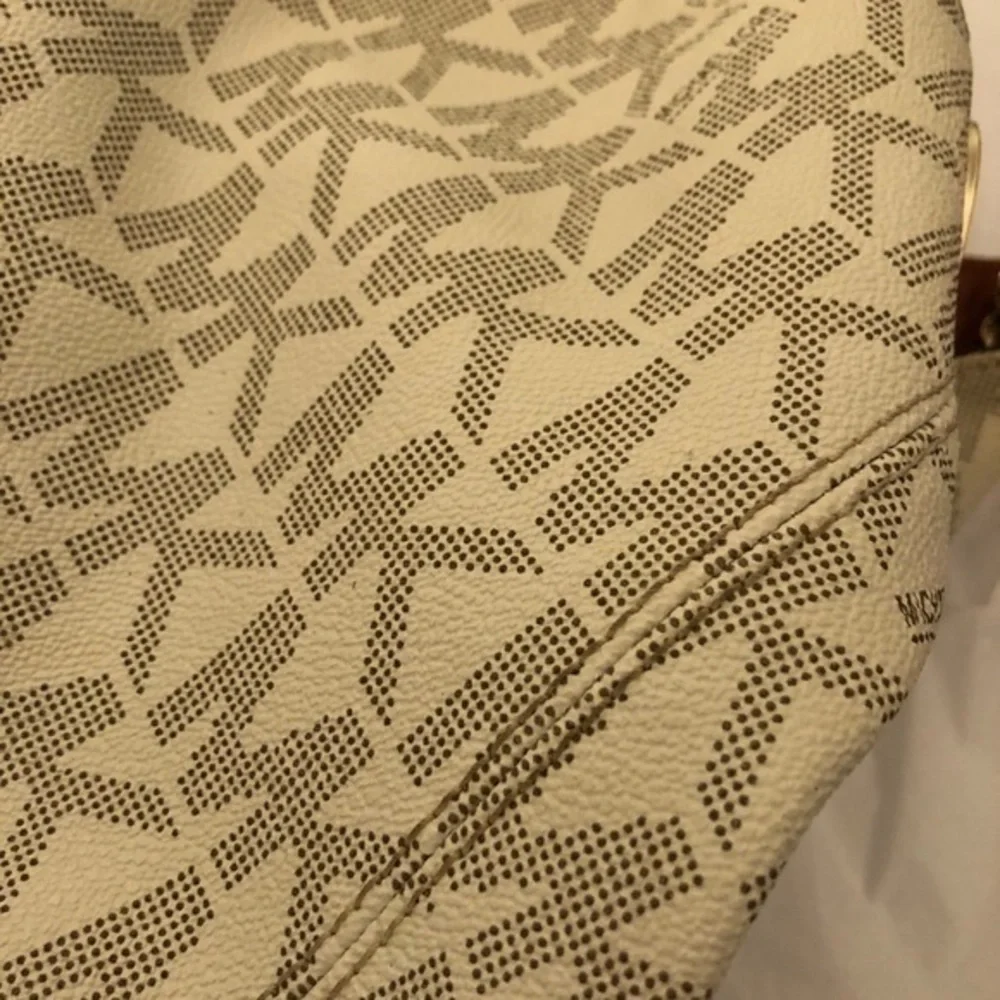 Michael kors white monogram triple compartment bag